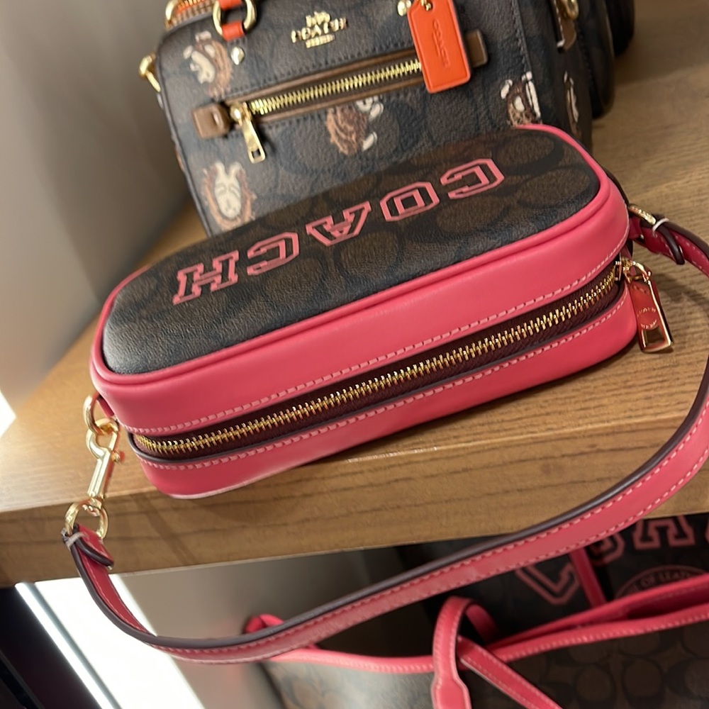 Coach Jamie Wristlet In Signature Canvas With Varsity Motif
IM/Brown/Watermelon - Picture 11 of 16